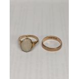 A 9ct gold opal ring together with a 9ct gold wedding band, total weight including opal stone 5.3g