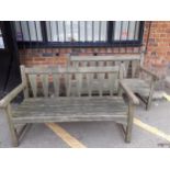 Two weathered garden benches. Location:G