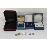 A mixed lot of jewellery to include a pair of 9ct gold earrings inset with diamonds and ruby, and