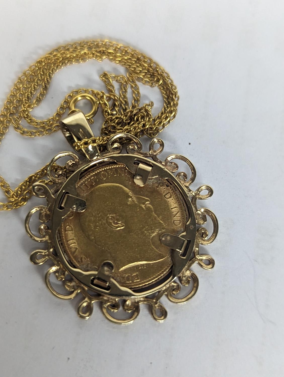 A 1908 Edward VII half sovereign, in a 9ct gold pendant setting, with later chain, 8.4g Location: - Image 2 of 2
