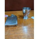 A George V silver hip flask with turn screw cap, London 1926 maker's mark indistinct, along with a