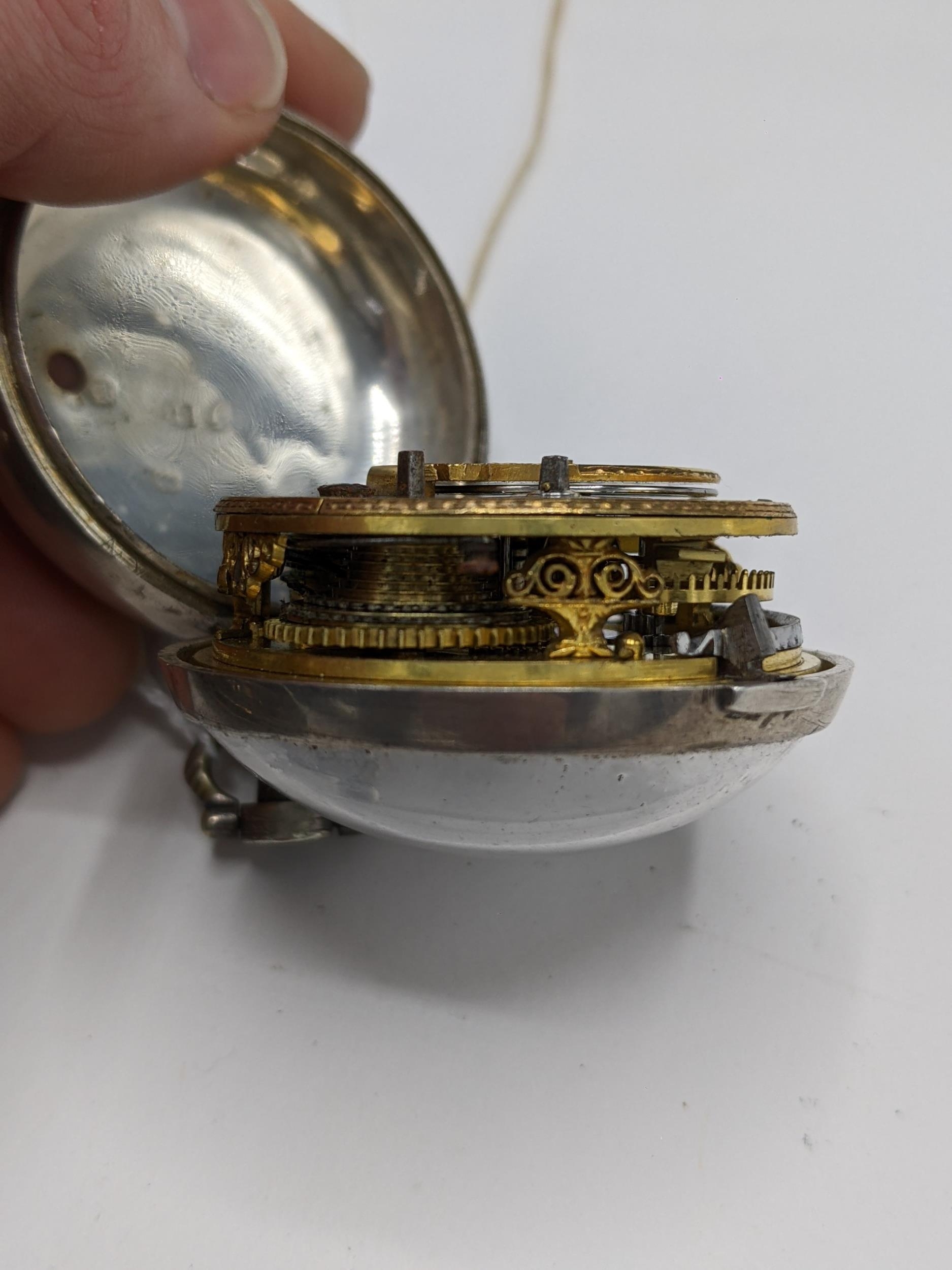 An early 19th century triple tortoise shell and silver cased pocket watch, designed for the - Image 9 of 10