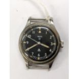 A Smith, military issue, gents stainless steel wristwatch, having a black dial with centre