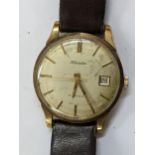 A Nivada automatic, 9ct gold cased wristwatch having a silvered dial with central seconds, baton