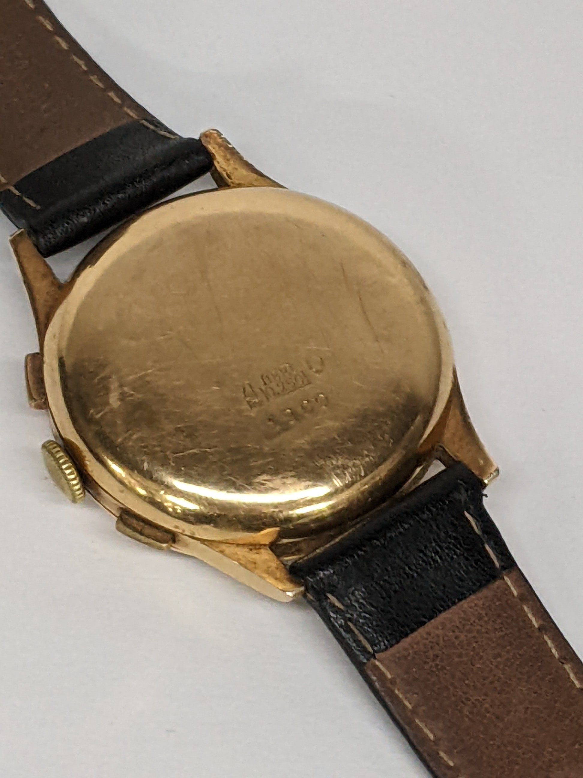 A mid 20th century 18ct gold, chronograph manual wind, gents wristwatch, having a silvered dial with - Image 3 of 4