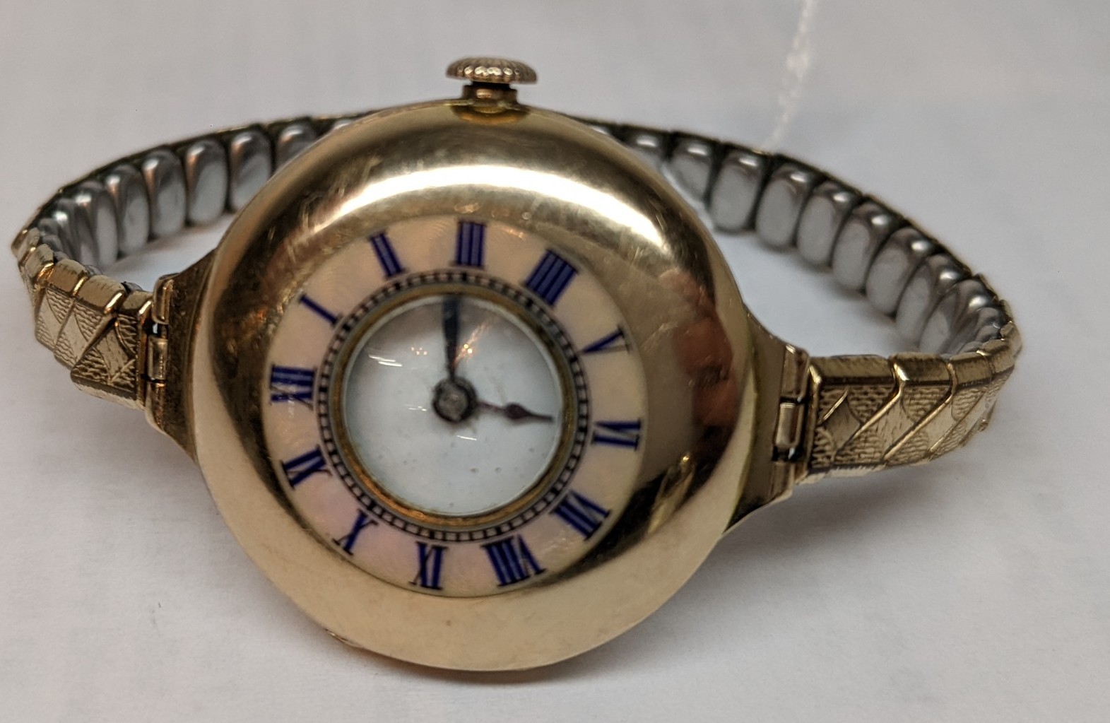 An early 20th century 9ct gold ladies half hunter wristwatch, having a white enamel dial, blued - Image 2 of 5