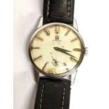 An Omega, manual winding gents stainless steel wristwatch, having a textured dial with subsidiary
