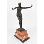 After Demétre H. Chiparus (1886-1947), an Art Deco style bronze dancer on stand, with each arm