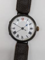 An early 20th century Rolex, gents, manual wind, silver, wristwatch, having a white enamel dial with