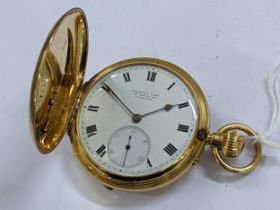 A circa 1947 18ct gold cased full hunter pocket watch, having a white enamel dial signed Russells