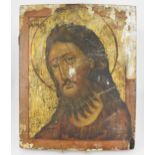 A 19th Century Russian painted icon of Christ, possibly of Saint John the Baptist