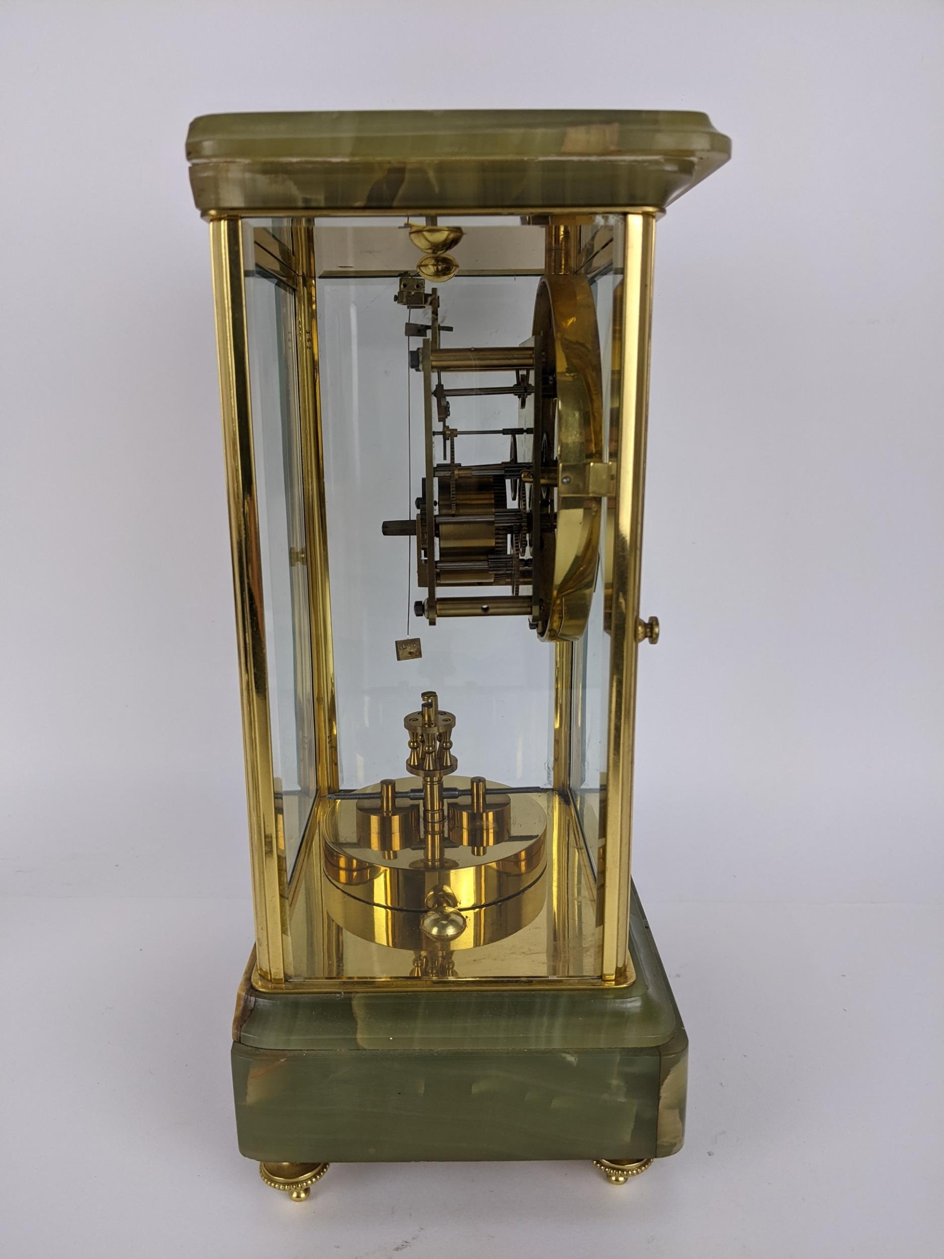 A late 19th century onyx and brass mantle clock, the case having a stepped cornice above a - Image 3 of 6