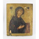 A 19th century Russian icon of the Madonna, with Cyrillic letters either side of her, tempura on