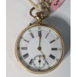 A late 19th/early 20th century yellow metal open faced traveller's pocket watch, having two white