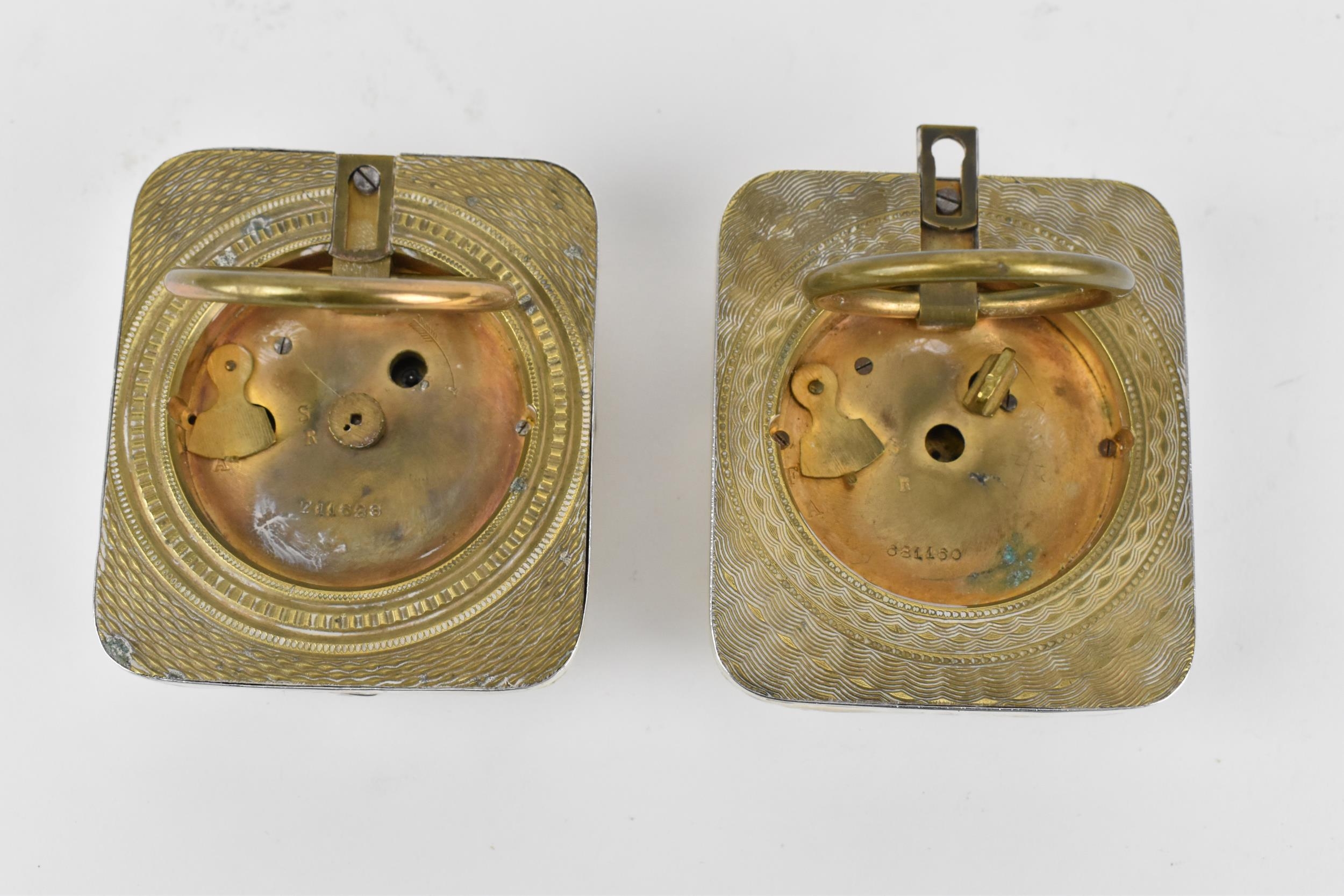 A pair of late Victorian silver cased travel clocks, Birmingham 1897, the cases embossed with - Image 7 of 7