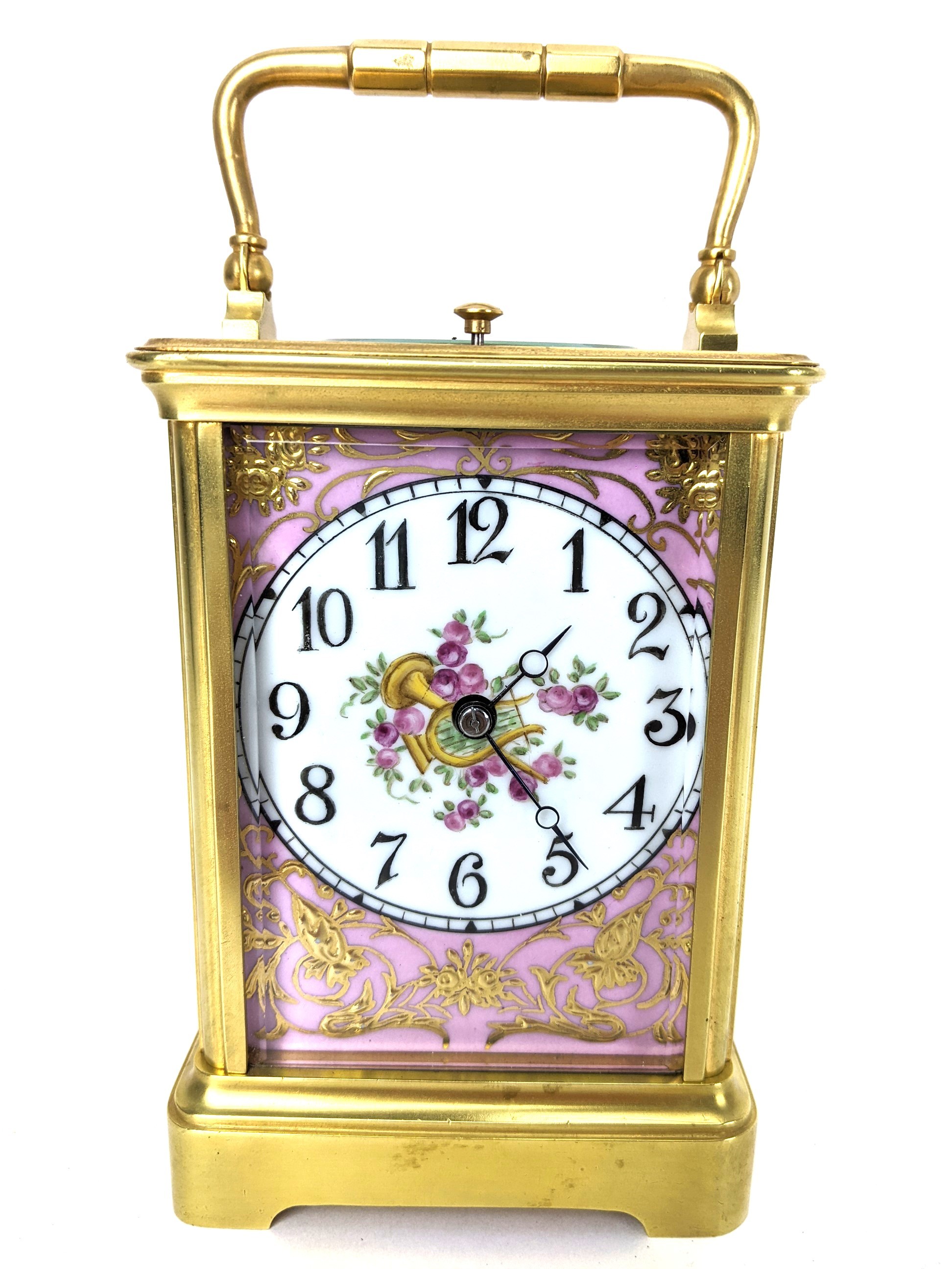 An early 20th century repeater carriage clock, having Sevres style porcelain panels decorated with