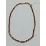 A 9ct rose gold curb link pocket watch chain with a 9ct dog clip and a 15ct dog clip, 43cm long,