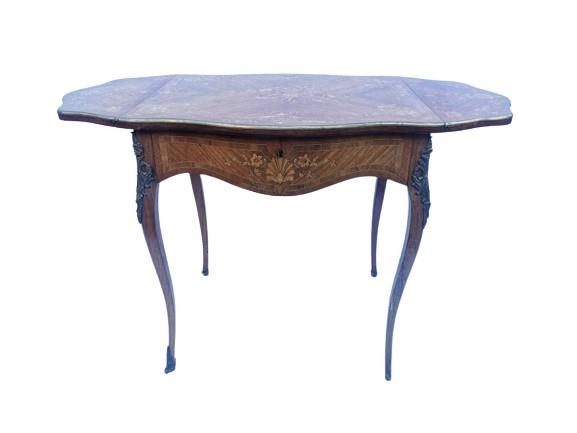 A George III ormolu and brass mounted rosewood and marquetry pembroke table, the serpentine top