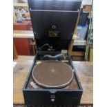 A HMV tale top gramophone in a black case Location: