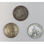 A group of three silver coins to include an 1893 Queen Victoria Crown, along with two USA Morgan