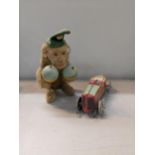 A Carl Western Germany vintage wind-up monkey together with tin wind up car Location: