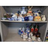 A mixed lot to include a pair of Sitzendorf figurines, Doulton stoneware vase, teapots, Japanese