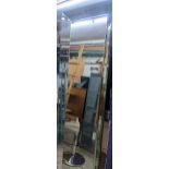 A large contemporary glass panelled wall mirror 200cm x 60cm Location:
