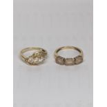 A 14ct gold ring set with white stones, together with a 9ct gold ring inset with paste stones, total