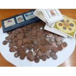 A large quantity of old pennies and other coinage together with a 1987 coin collection and a 1975