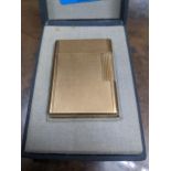 A cased gold plated Dupont Paris cigarette lighter serial number BK2968 Location: