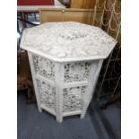 A circa 1900 Indian relief carved white painted teak octagonal occasional table, 64cm h x 60cm w