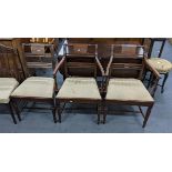 A set of three Regency mahogany dining chairs together with a set of three Edwardian Adams style