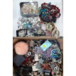 A quantity of modern costume jewellery to include bangles, silver items and bead necklace