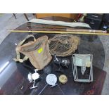 A small group of vintage fishing equipment to include a split cane fishing rod, various reels to