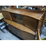 A mid 20th century walnut sideboard, a smoked glass topped chrome table and four teak finished