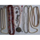 A quantity of vintage costume jewellery to include Pompadour simulated pearls and 3 others,