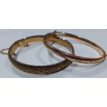 A 9ct gold metal core engraved bangle with safety chain, 7.5g, together with an Eastern ornate