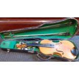 A violin A/F with 2 bows in a fitted case.