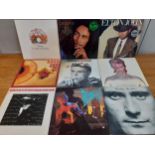 A quantity of LP's, 12" records and 45rpm singles to include Bob Marley, Elton John, Queen, Kate
