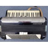 A Hohner Carena III M piano accordion in travel case. Location:G