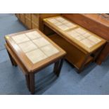 A mid 20th century teak and tile topped coffee table together with a matching nest of three tables