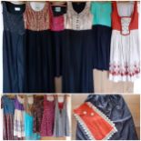 A quantity of Austrian Dirndl and other Dirndl style ladies dresses, some with aprons to include