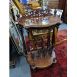 Victorian mahogany Canterbury table, pierced back flanked by turned finials, with mirrored apron