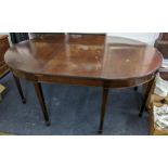 Circa 1820 a circular mahogany dining table with square tapering legs, with spare leaf, 75cm h x