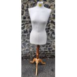 A late 20th Century adjustable mannequin on treen stand. Location:BWR