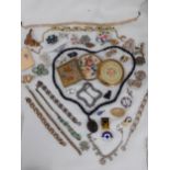 Vintage costume jewellery to include paste brooches, silver filigree brooches and bracelets and faux