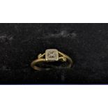 An 18ct gold and diamond set solitaire plaque ring 2.15g A/F Location: