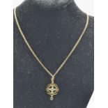 A 15ct gold Edwardian pendant set with seed pearls and coloured stones on a necklace 7.5g Location: