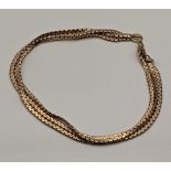 A 9ct gold tri-strand bracelet A/F, total weight 5.3g Location: