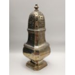 An early 20th century silver sugar castor of octagonal baluster form, hallmarked Birmingham 1930,